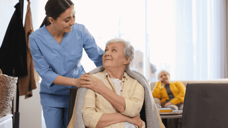 Image of a caretaker and patient