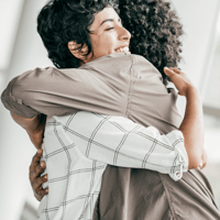 Two women hugging