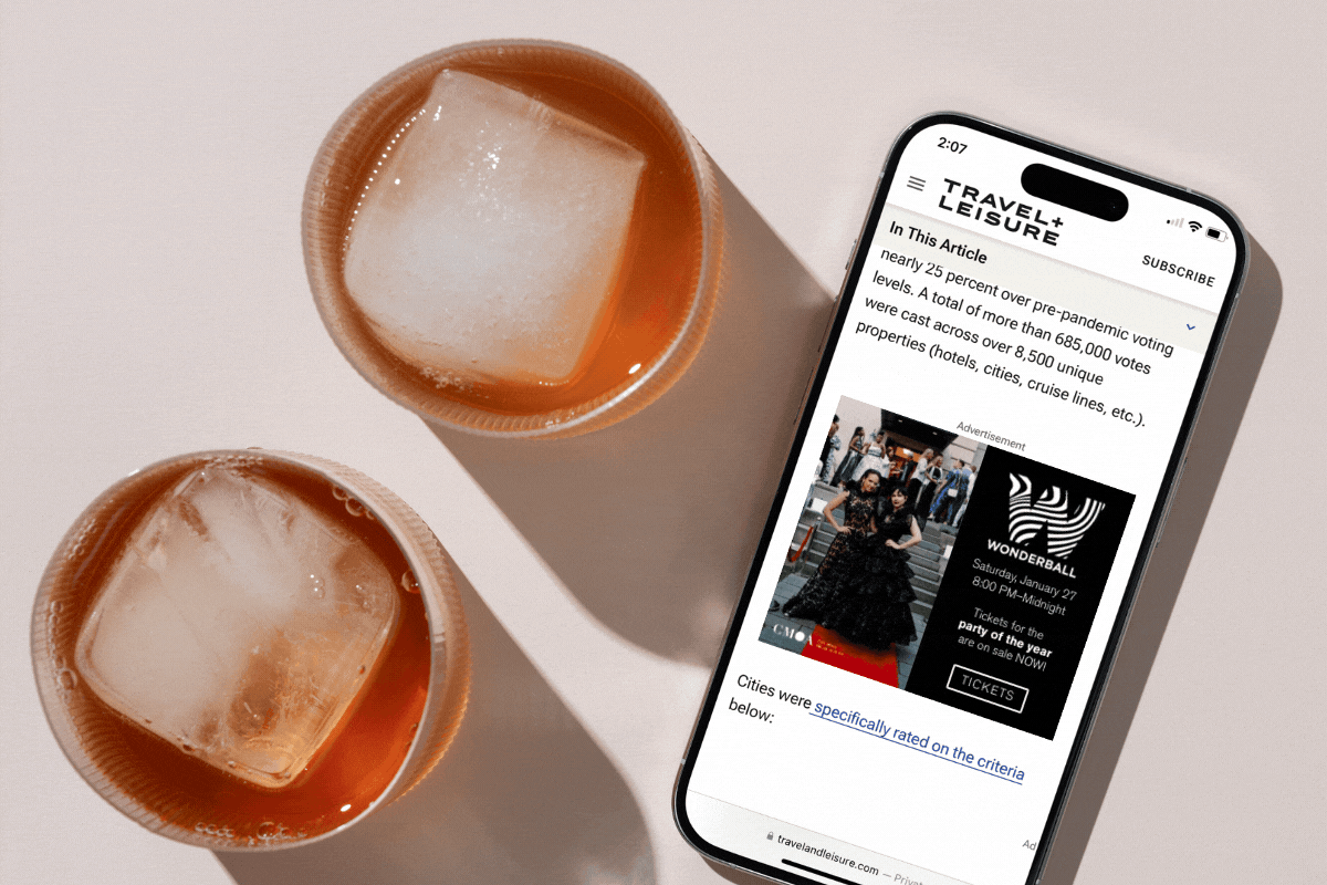 Image of mobile phone with CMA digital ad showing on website