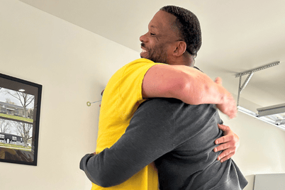 Anthony celebrating one year sobriety at Guiding Light, nonprofit