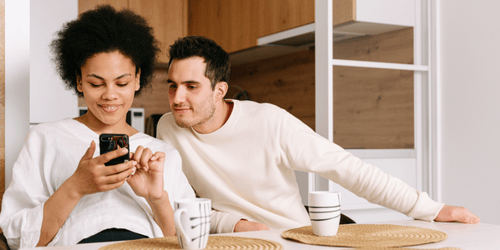 Image of a couple of donors engaging with a nonprofit after the year