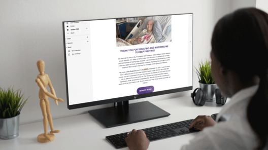 Image of person looking at a thank you email from a nonprofit after donating
