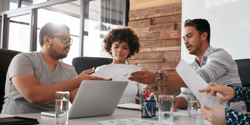 Image of three people in a meeting